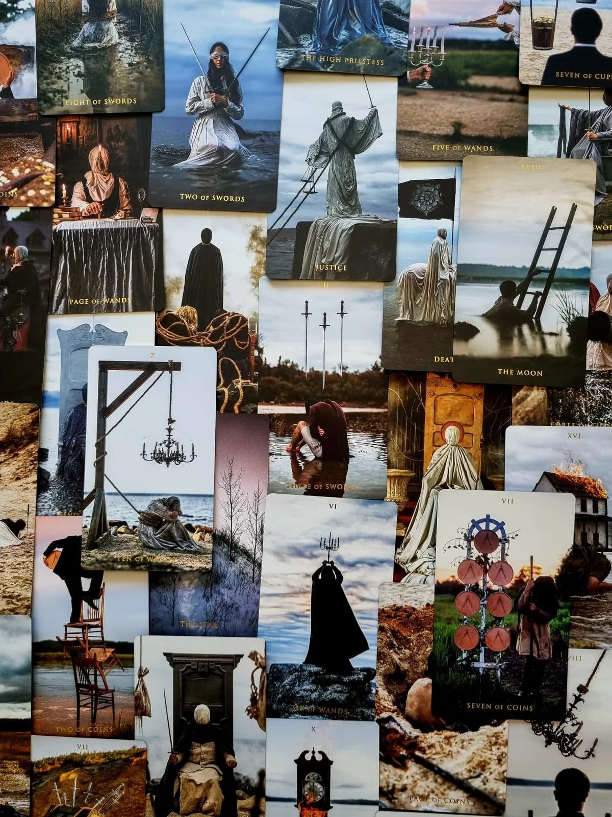 Second dense collage of Somnia Tarot cards including The High Priestess, Two of Swords and Seven of Cups laid edge to edge